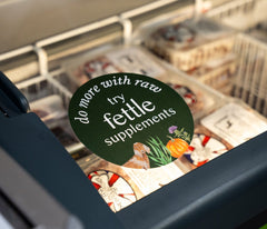 Do more with raw, try Fettle supplements sticker on a raw food freezer in a stockist